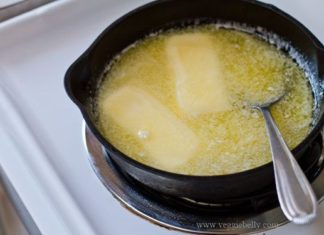 Removing Oily Layer from Soup Pot with Paper Towel Transformed Dish to Delicious Meal Thanks to Restaurant Chef