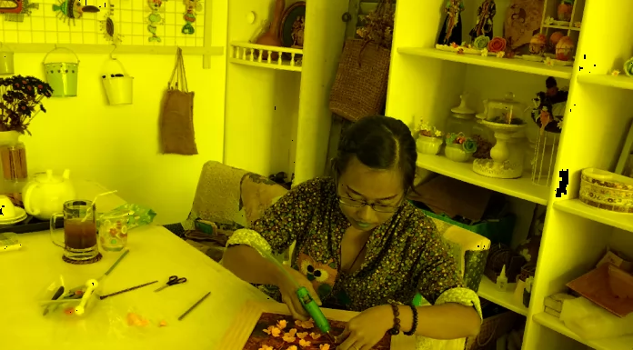 The Girl Makes Clay Blossom