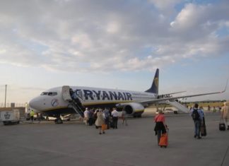 Why do passengers always board the plane through the left door?
