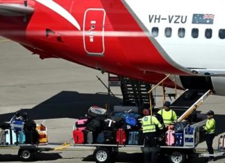 Which suitcase is most likely to get damaged when checked in on a plane?