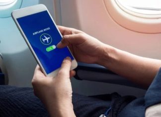 Why should you turn off your phone when on an airplane?