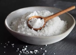 What is the purpose of placing a bowl of salt in the corner of the house?