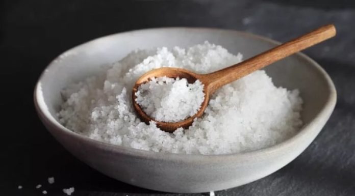What are the benefits of placing a bowl of salt in the corner of a house?