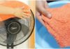 What is the effect of placing a wet towel on a fan?