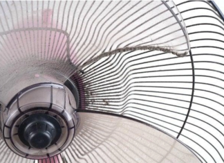 Why do fans accumulate dust quickly after a period of use?