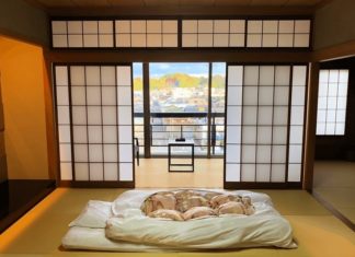 Why do Japanese people prefer sleeping on the floor instead of on a bed?