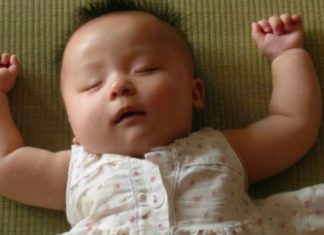The Reason Why Children Love to Raise their Hands in Surrender when Sleeping?