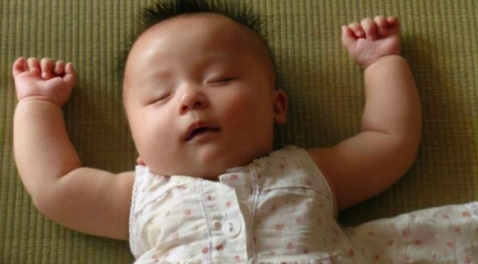 The Reason Why Children Love to Raise their Hands in Surrender when Sleeping?