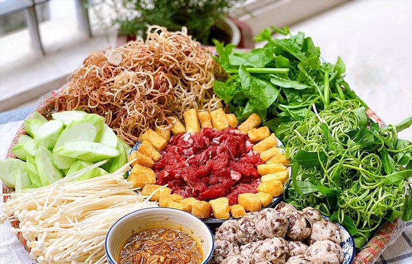 Delicious and tangy homemade wild crab soup recipe with a golden hue