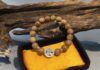 Differentiating genuine from fake agarwood bracelets, a guide to attract fortune and abundance.