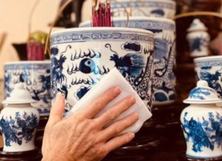 Should we clean the altar before or after offering to the Kitchen God?