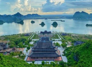 The largest temple in the world is located in which province of Vietnam? Why is it compared to ‘Hạ Long on land’?