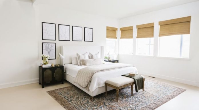 Why is there always a chair at the end of a hotel room, what is it for?