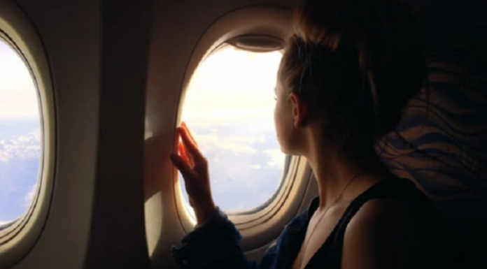 Why do airplane and train windows have an oval shape?