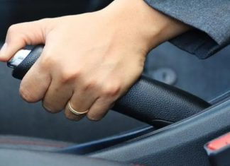 What is the safest way to brake when driving: using the front brakes, the rear brakes, or all four brakes at once?