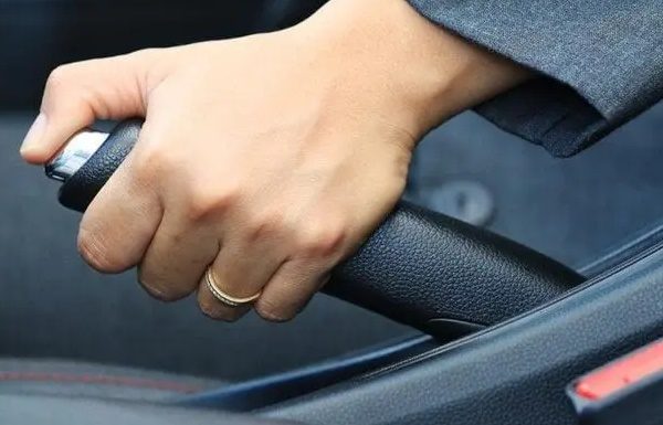 What is the safest way to brake when driving: using the front brakes, the rear brakes, or all four brakes at once?