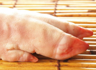 Should I choose the front or back leg when buying pork shank?