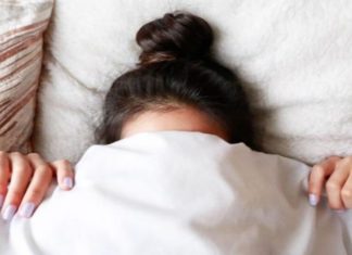 Should You Be Tying Your Hair Up Before Bed? Ask an Expert!