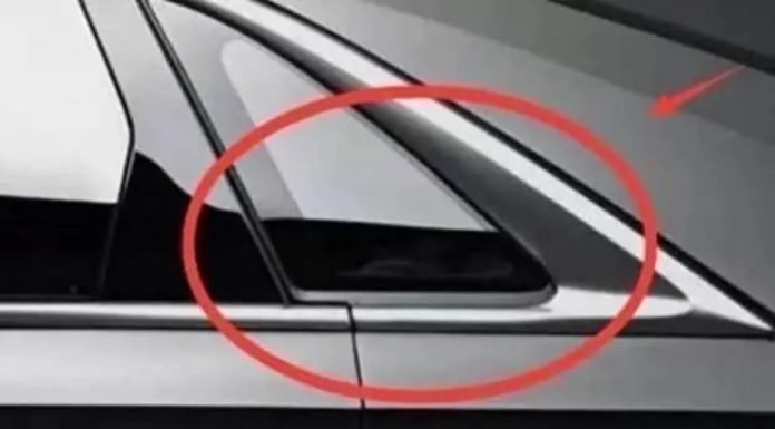 What is the purpose of the fixed triangular glass window frame on the side of a car?