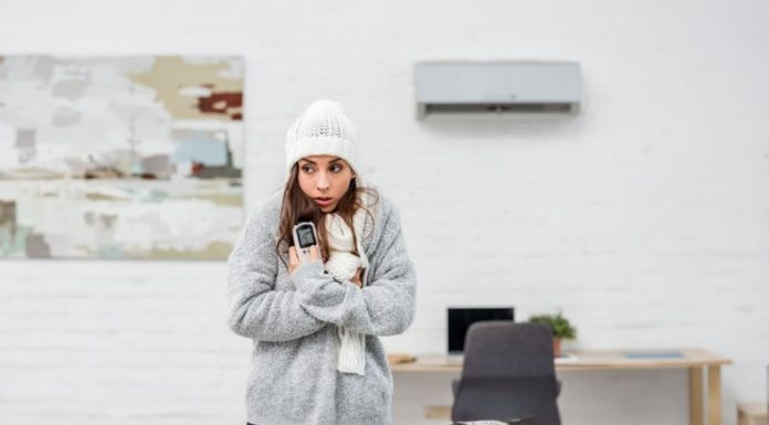 How high should you set your air conditioner to stay warm during extreme cold weather?