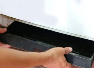 Effective Strategies for Cleaning the Water Pan Behind the Refrigerator