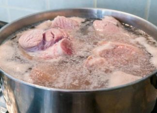 Why does bone broth often froth when cooking?