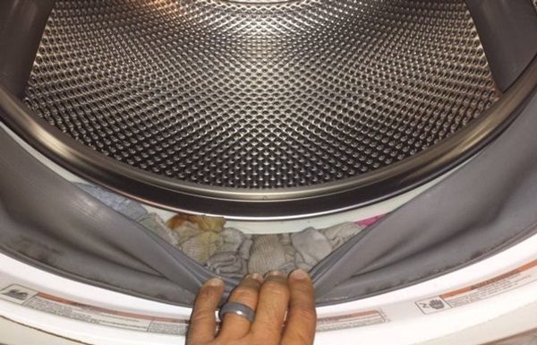 Check for this “dangerous” spot on your washing machine to prevent any further damage