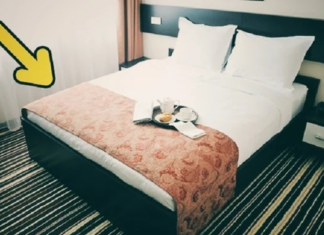 What is the purpose of the fabric at hotels and inns, which is spread across the bed?