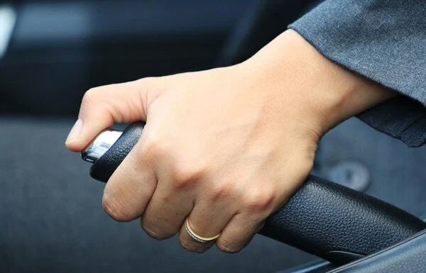 When should you never use the handbrake?