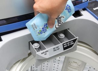 Guide to Cleaning and Utilizing the Fabric Softener Compartment of a Washing Machine