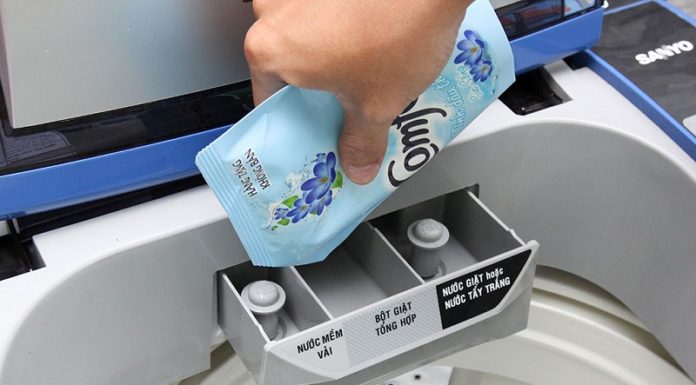 Guide to Cleaning and Utilizing the Fabric Softener Compartment of a Washing Machine