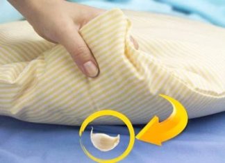 What are the benefits of placing garlic under the pillow while sleeping?