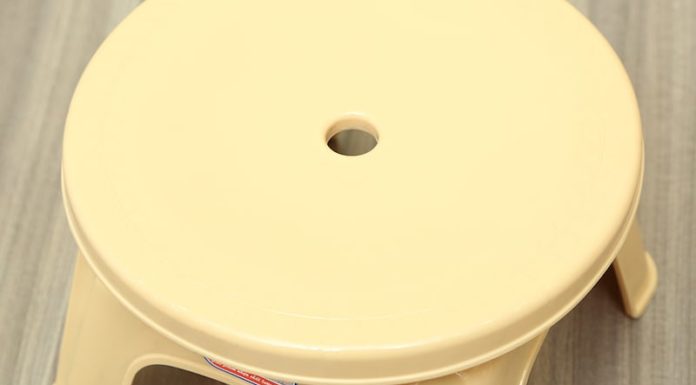 Why does a plastic chair usually have a hole in the middle?