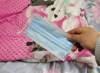 An uncomfortable lumpy down comforter? Just wear a face mask and solve the problem.