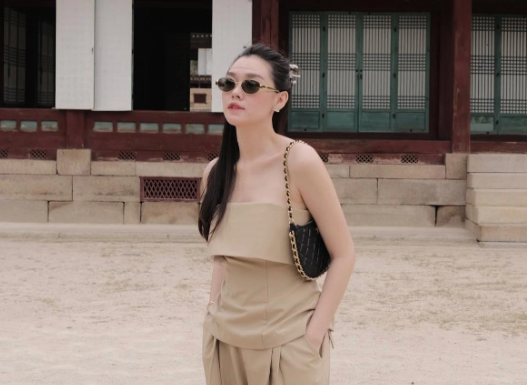 A Vietnamese beauty queen loves neutral tones, looking elegant in any outfit