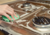 What does pouring vinegar on a gas stove do?