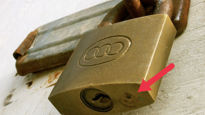 What’s the Purpose of the Small Circular Hole in a Padlock?