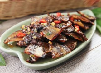 A Culinary Journey: Golden-Striped Trevally Enrobed in a Luscious Fermented Fish Sauce Glaze