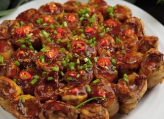 Eggplant Rolls with a Savory Twist: Pan-fried to Perfection with a Juicy Shrimp and Pork Filling, Accompanied by a Zesty Tomato Dip