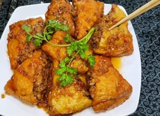 “A Delicious and Appetizing Recipe: Tofu Stuffed with Minced Meat, Braised in Lemongrass and Chili”