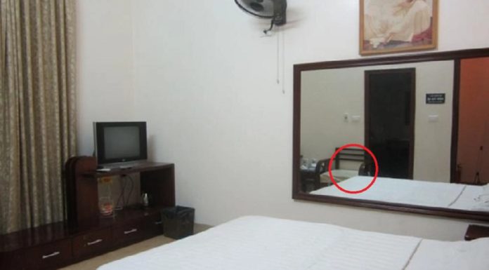 “Is Your Hotel Room Mirror Hiding a Secret? Uncover the Truth”