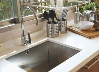 What is the Purpose of the Circular Hole Next to the Kitchen Sink?