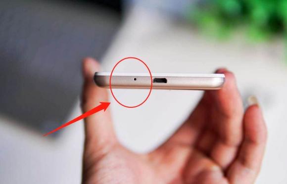 “The Little Hole Under Your Phone: What’s Its Purpose?”