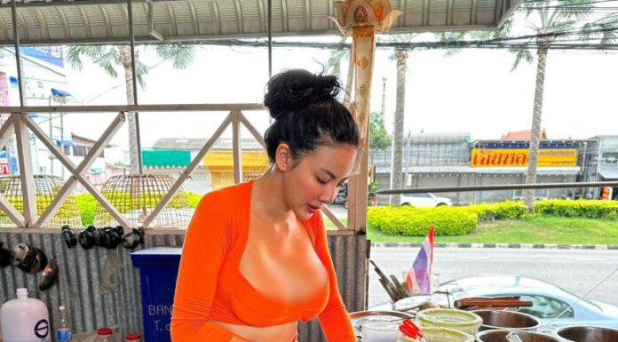 The Revealing Attire of the Cafe Owner: A Sight to Behold for Patrons