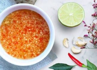 The Perfect Dipping Sauce: A Tasty Blend with Floating Chilli and Garlic Goodness