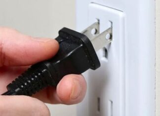 Why Do Flat Electrical Plugs Have Two Round Holes? The Reason is Amazing.