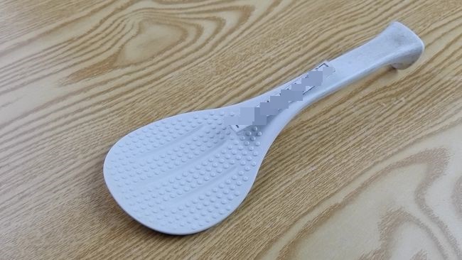 The Plastic Rice Spoon of an Electric Rice Cooker: More Than Just a Tool for Fluffing Rice.