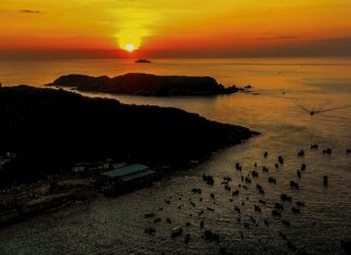 The Idyllic Scene of Nhon Ly Fishing Village at Dawn