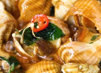 “A Thai Treat: Cinnamon Spiced Bulot Snails Stir-fried to Perfection”