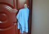 Why Do People Hang Towels on Door Handles in Hotels? This Hack is Genius.